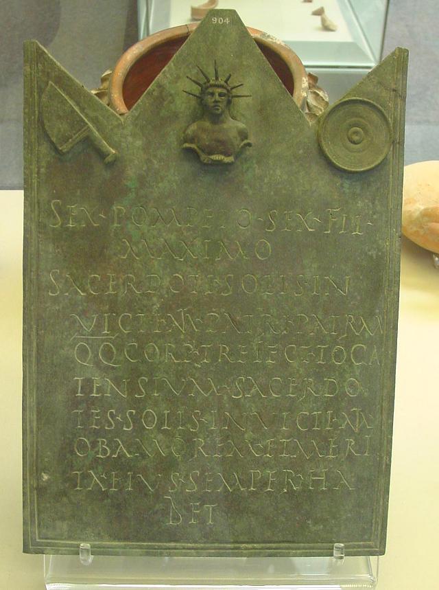 Placa de bronce con inscripción encontrada en el Mitreo Aldobrandini, Ostia