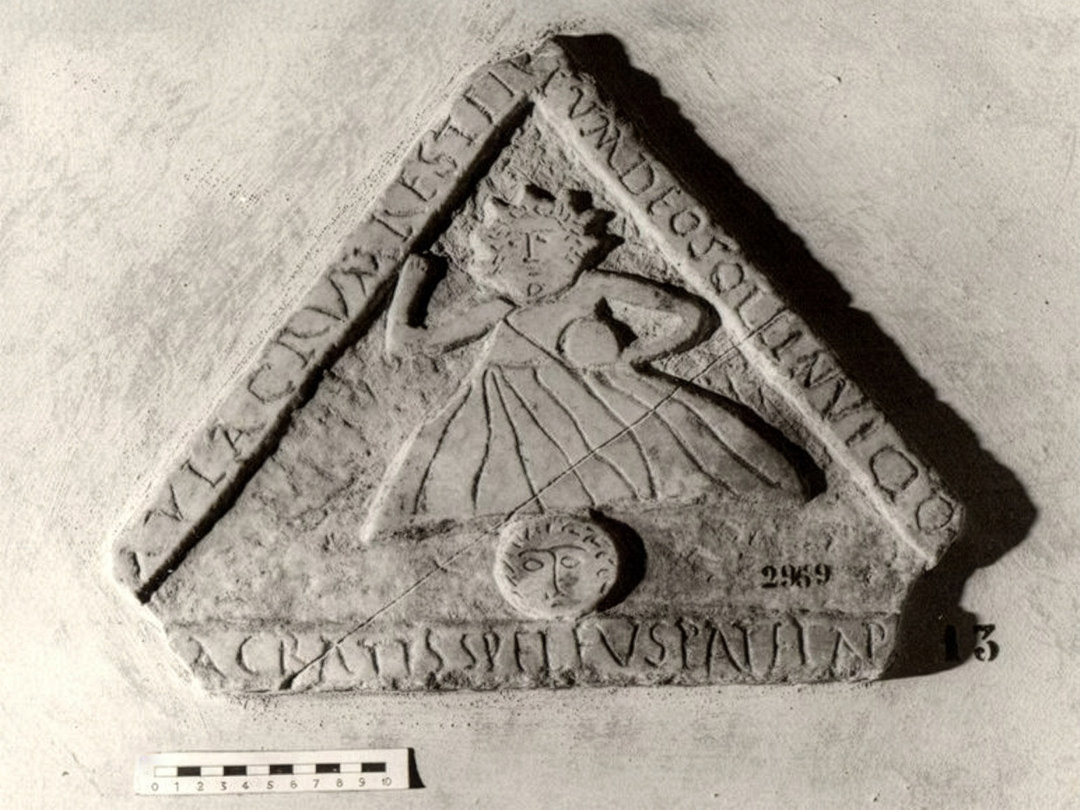 Unknown. Inscribed triangular relief fragment with reference to Sol Invictus.